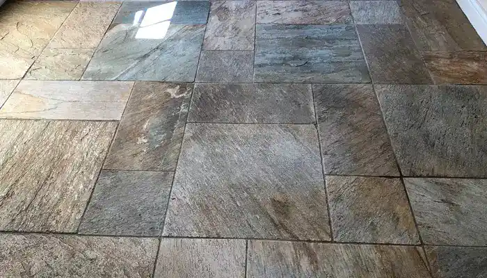 Slate floor still dull and uneven after routine cleaning